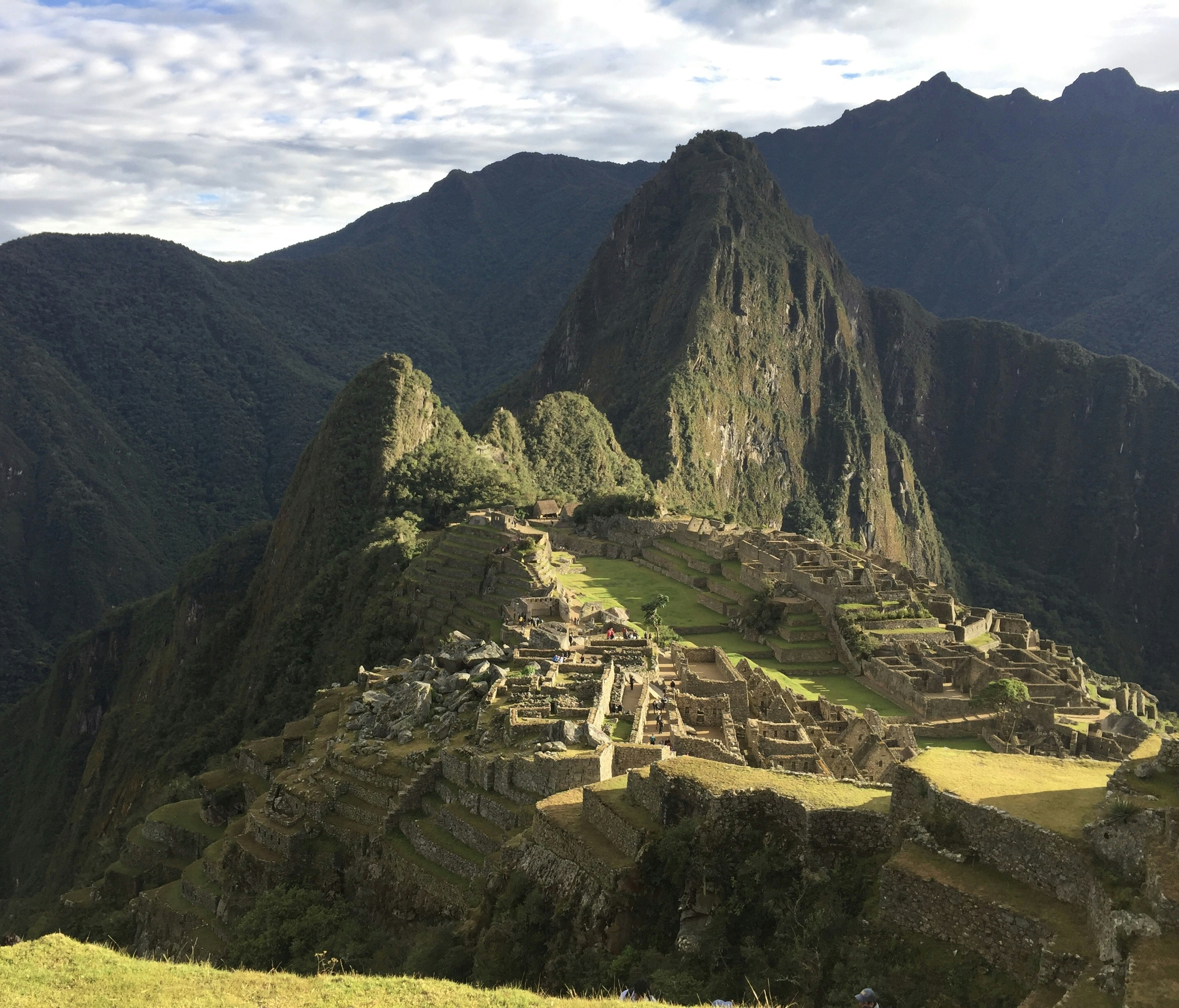 The Inca Citadel atop Machu Picchu with Huayna Picchu towering over it.