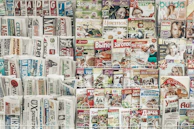 assorted-title magazines displayed on stand