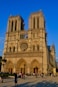 a large cathedral with a clock on the front of it