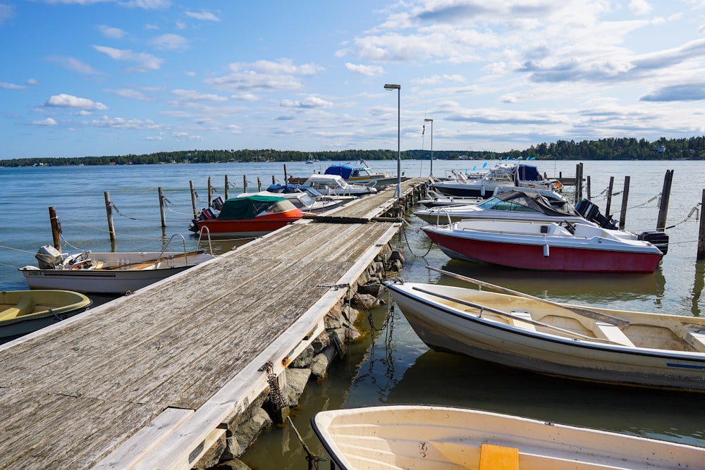 a group of boats that are sitting in the water