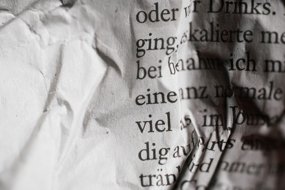 a close up of a piece of paper with words on it