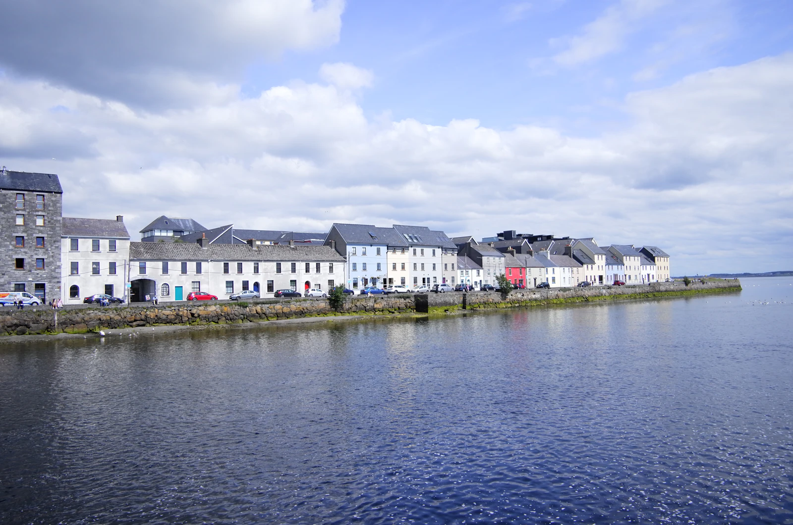 White houses beside sheltered water on Ireland's Atlantic coast