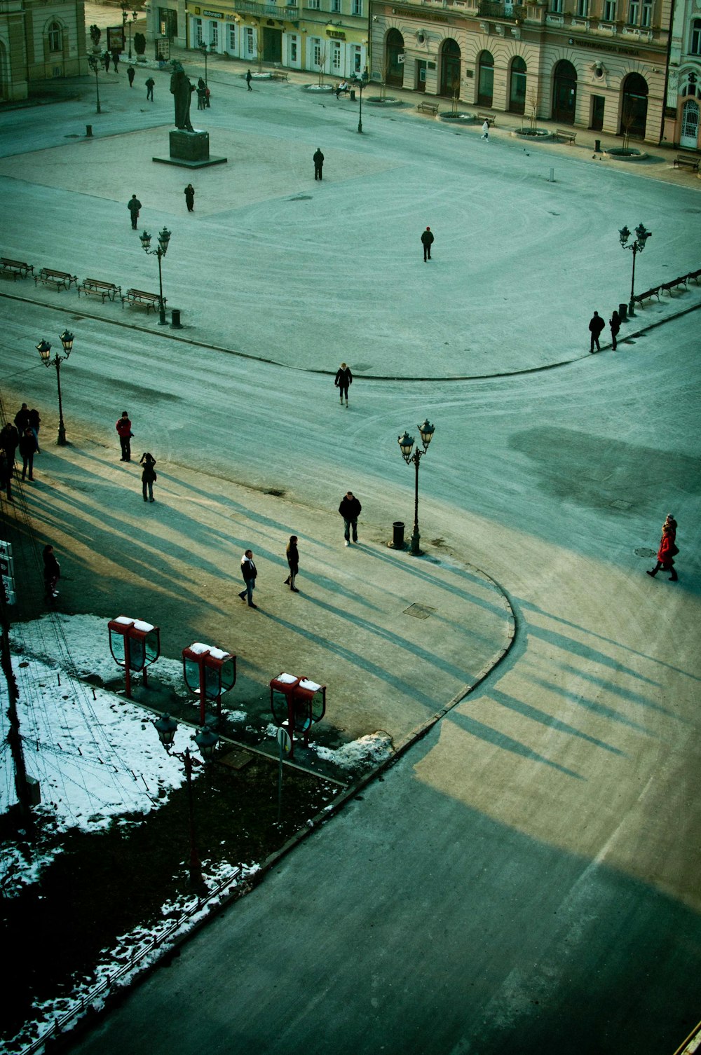 aerial photography of people on gray road