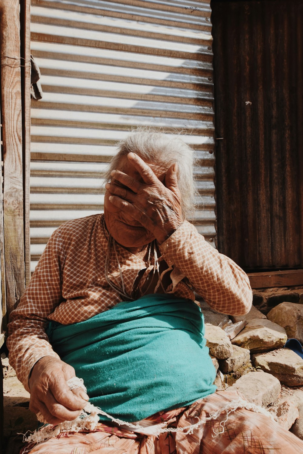 woman in brown and green