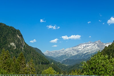 A scenic view of a travel destination with mountains and a clear sky.