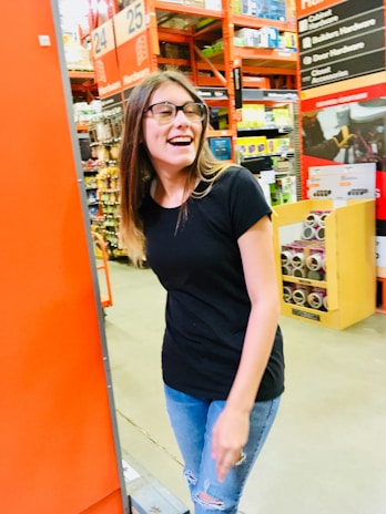A satisfied customer leaving the store with purchased electrical supplies.