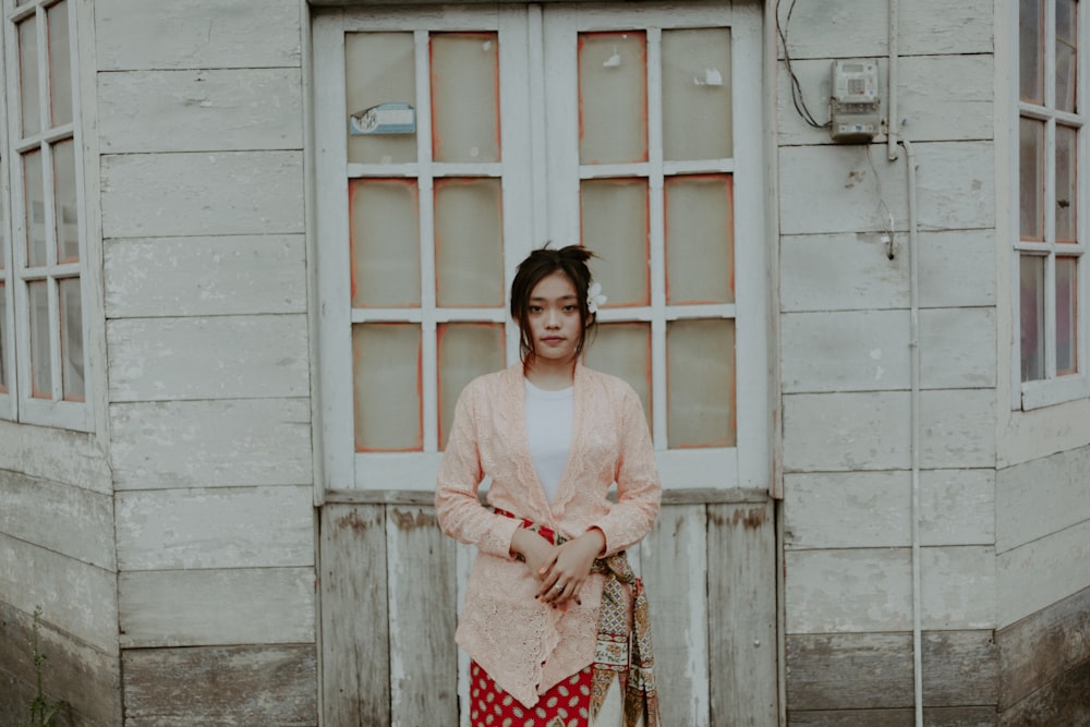 woman standing in front of building