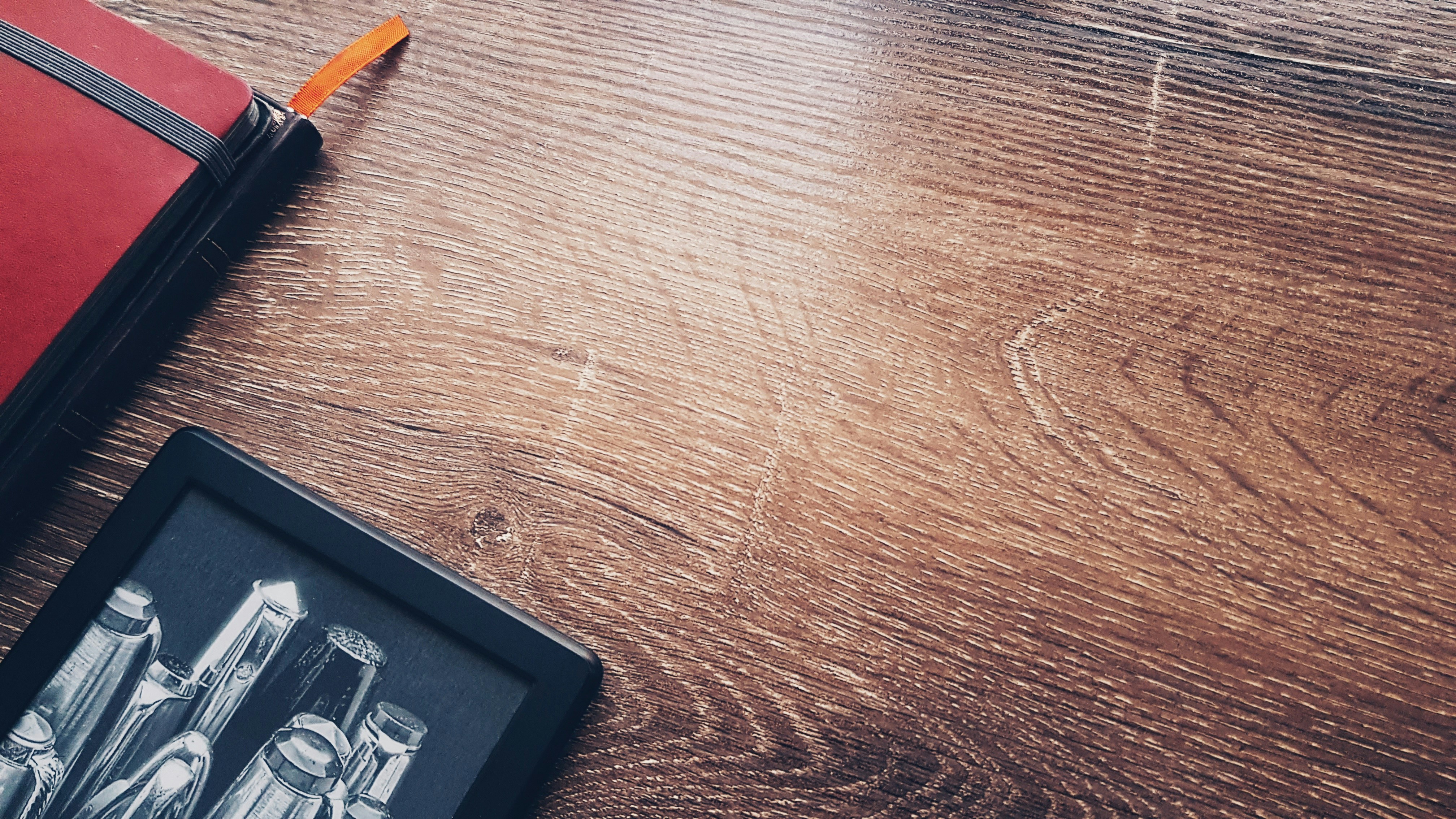 a picture of a picture and a pen on a table