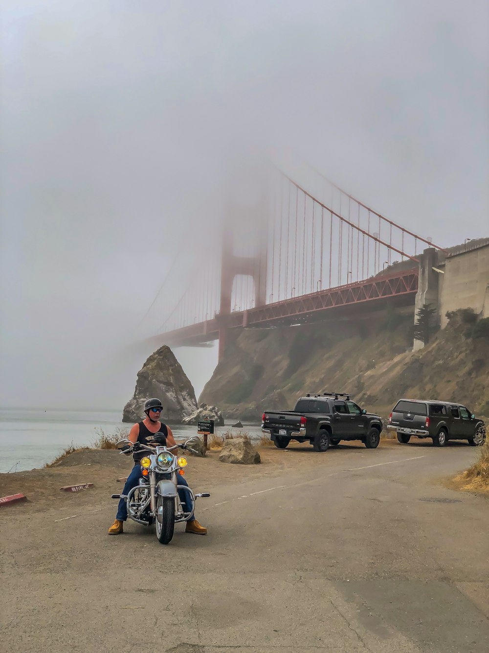 person riding on black and gray motorcycle during daytime