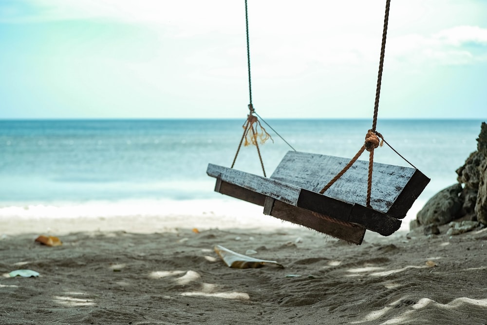 brown wooden swing seat