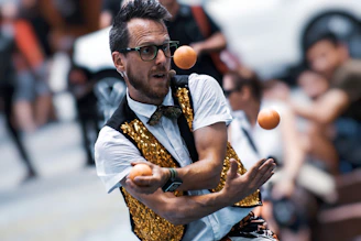 selected focus photogrpahy of man playing balls