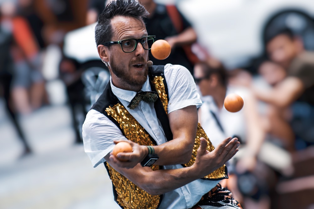 selected focus photogrpahy of man playing balls