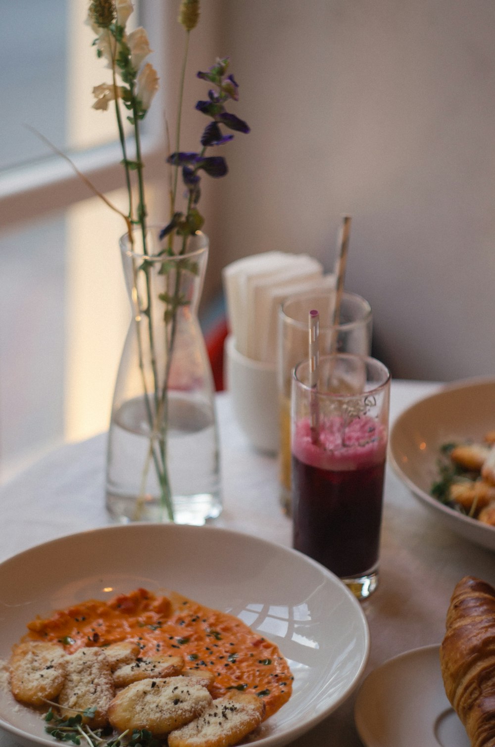 baked food on white ceramic plate close-up photography