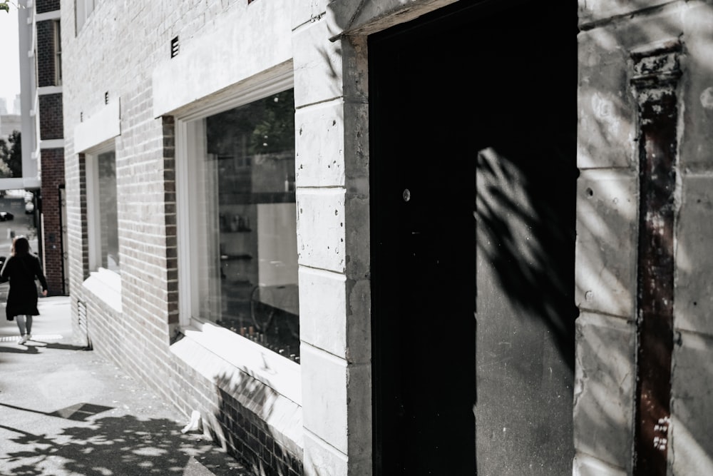 gray-scale photography of door