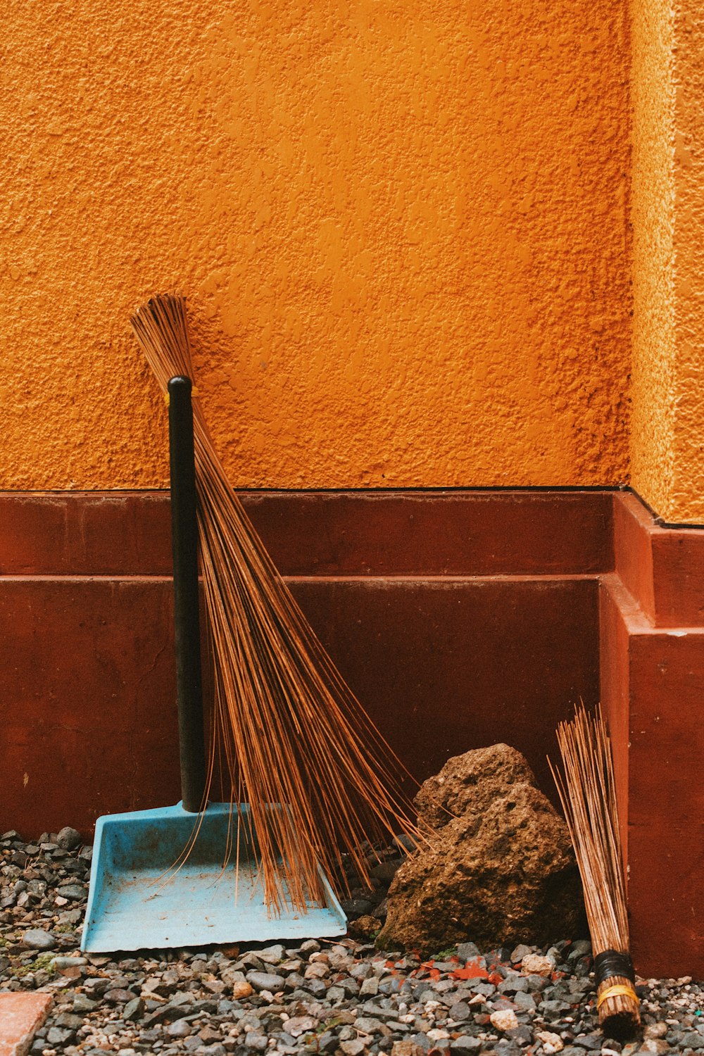 brown stick broom