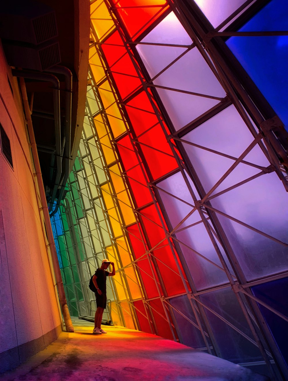 man near building window