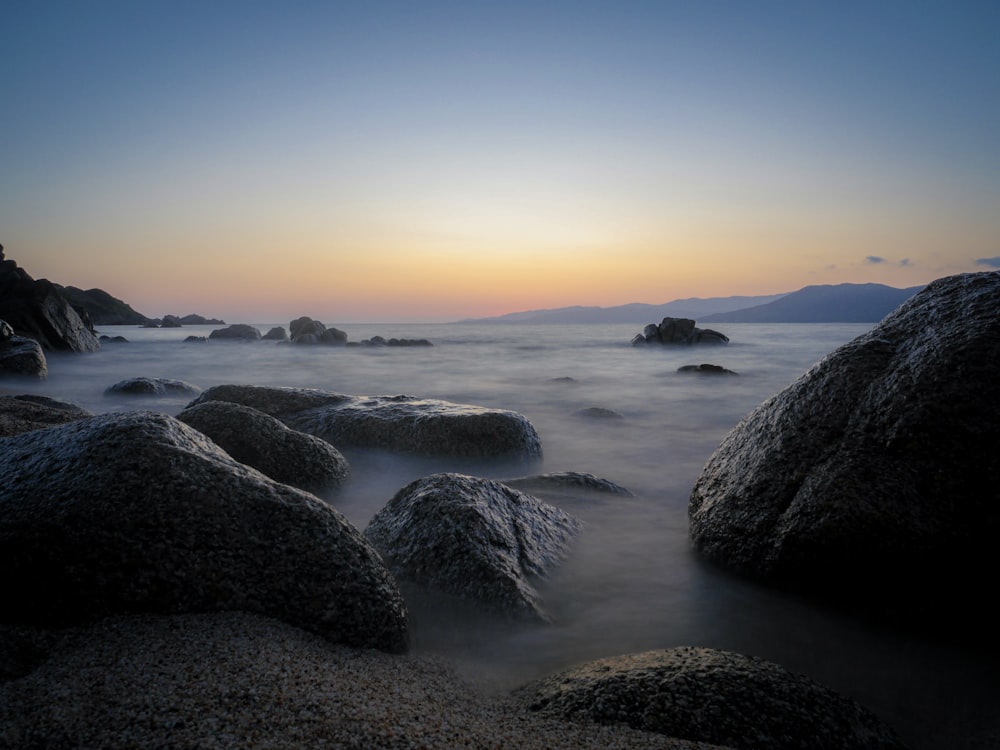 photography of seashore during nightime