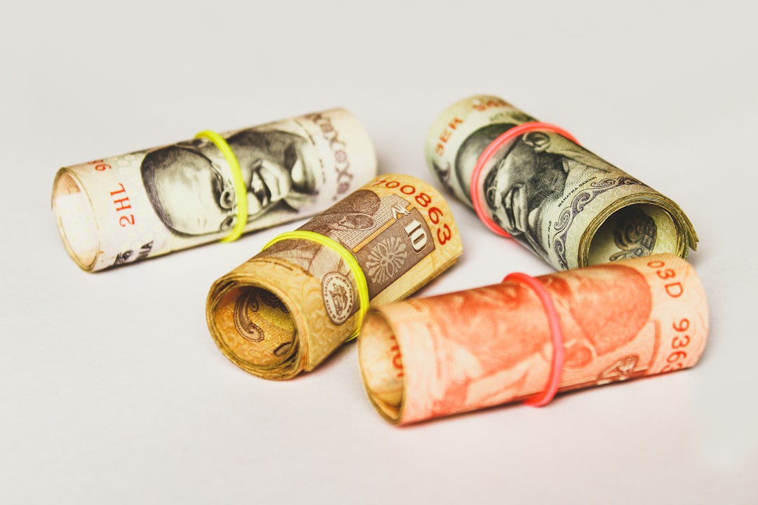 four Indian rupee banknotes,