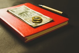 two coins on banknotes