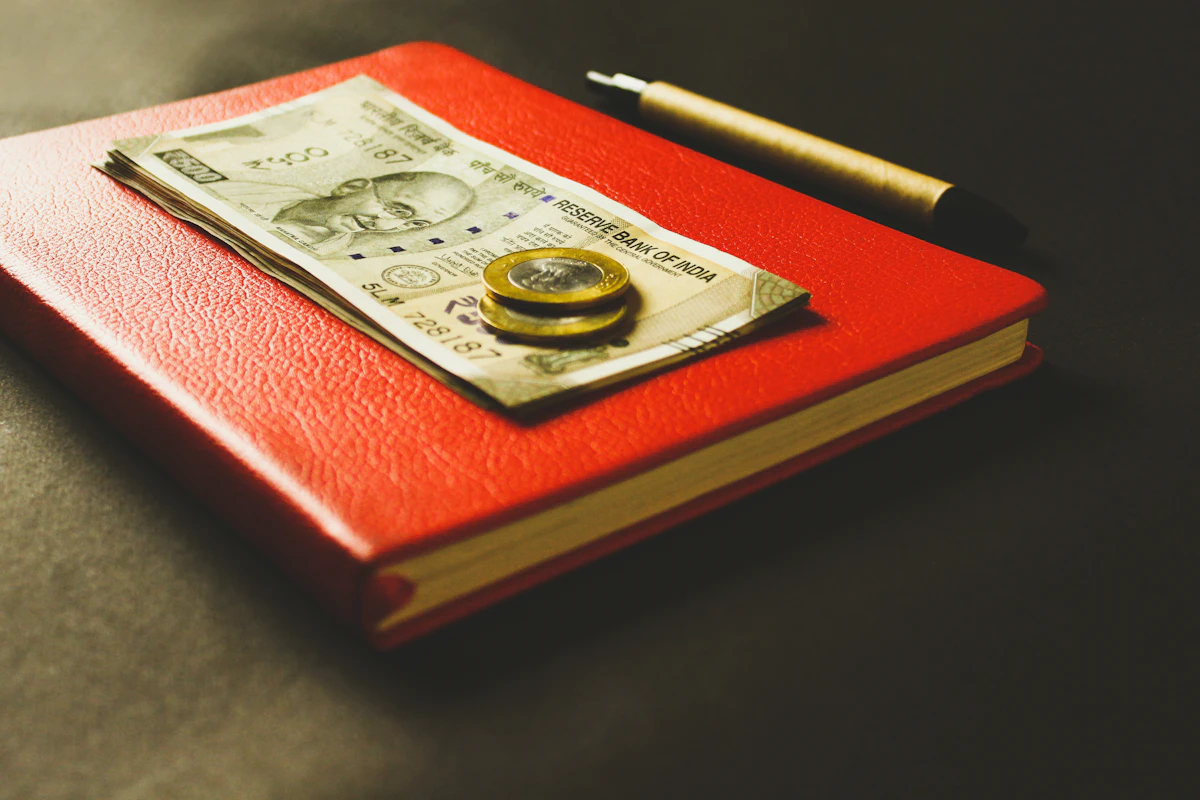Two coins on banknotes