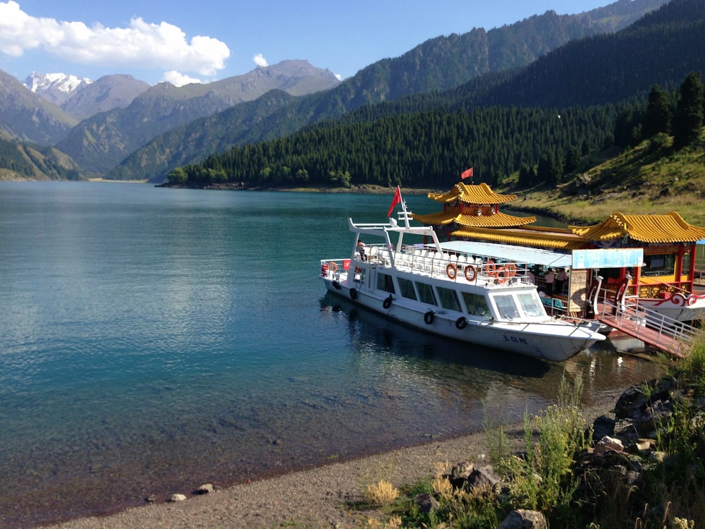 white boat on water