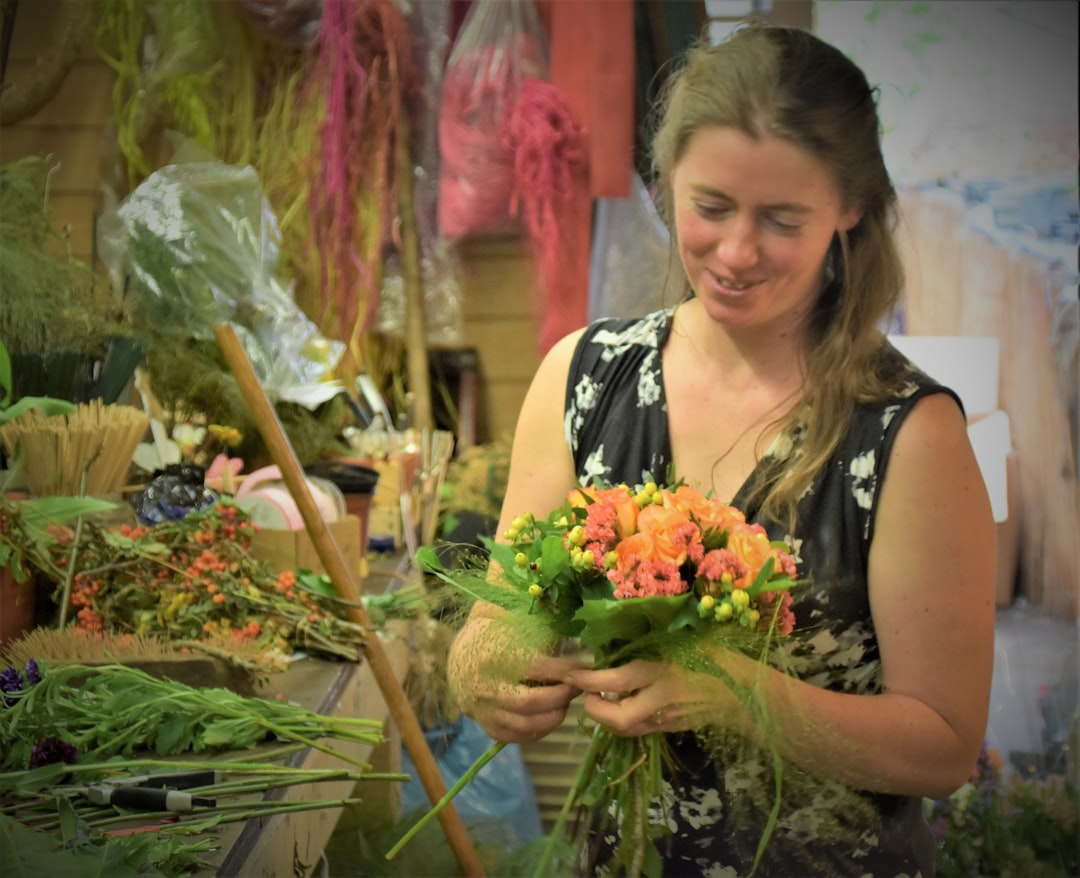 woman holding flower bouquet