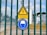 A fenced area with warning signs is visible. The yellow triangular sign includes a lightning bolt symbol and the German text 'Hochspannung Lebensgefahr,' indicating high voltage and danger to life. Below it is a blue circular sign with an icon of a person wearing a hard hat, suggesting mandatory safety equipment. Behind the fence, there are electrical installations, possibly part of a transformer station.