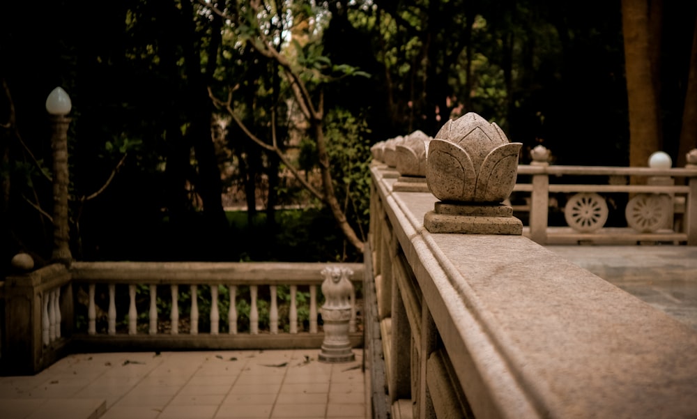 a view of a balcony with a stone planter