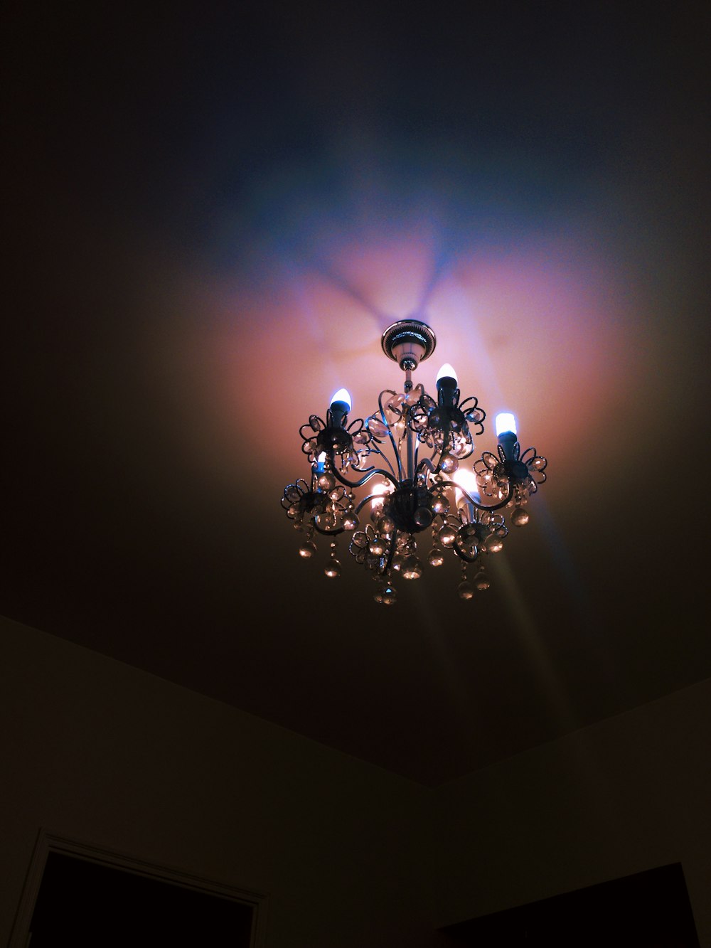 black metal framed uplight chandelier