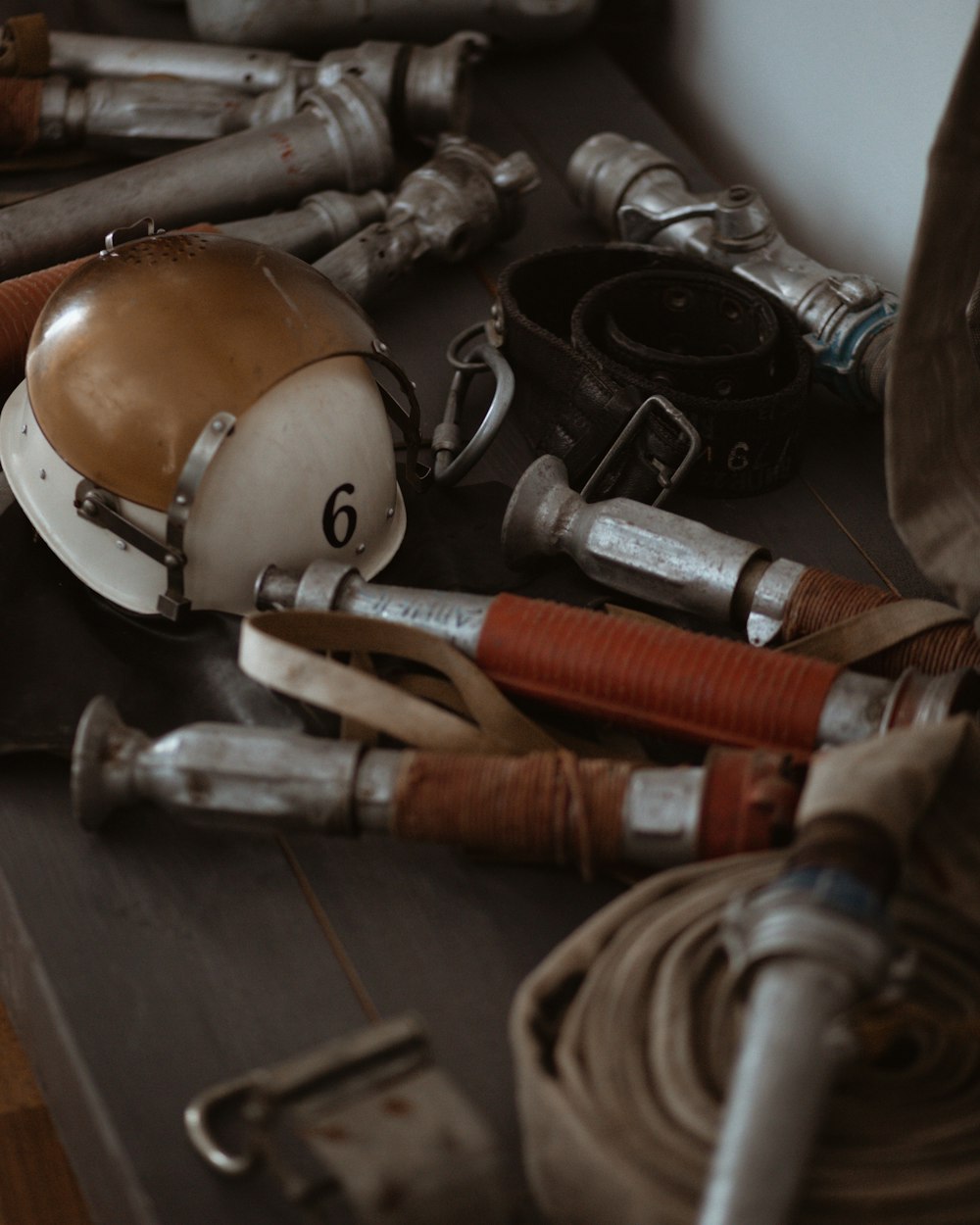 a table topped with lots of different types of tools