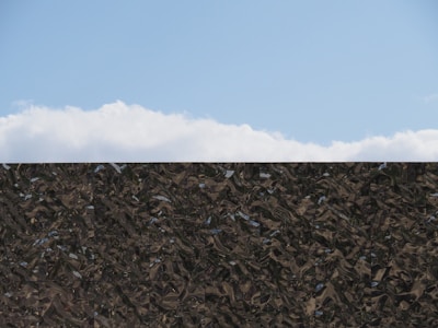 An abstract blue sky background with digital cloud icons representing Marble Sky LLC's secure and flexible solutions.