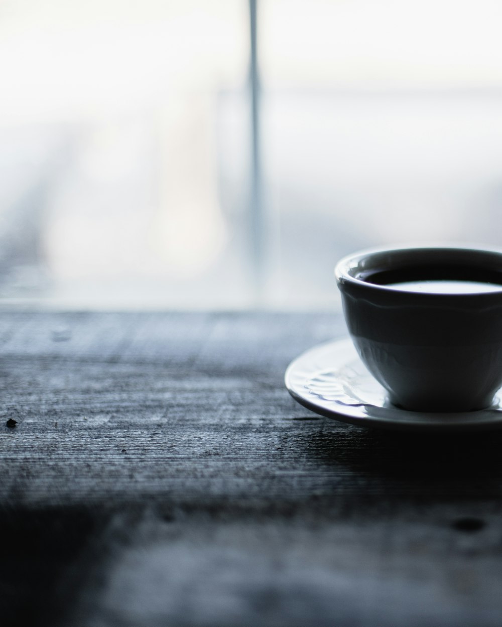 grayscale photo of ceramic mug