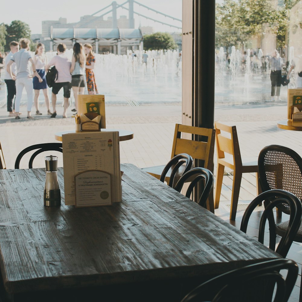 brown wooden table and chairs