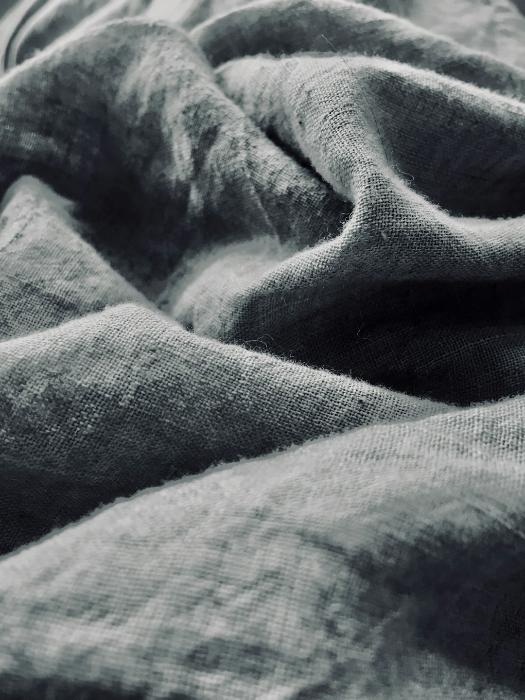  grey textile quilt