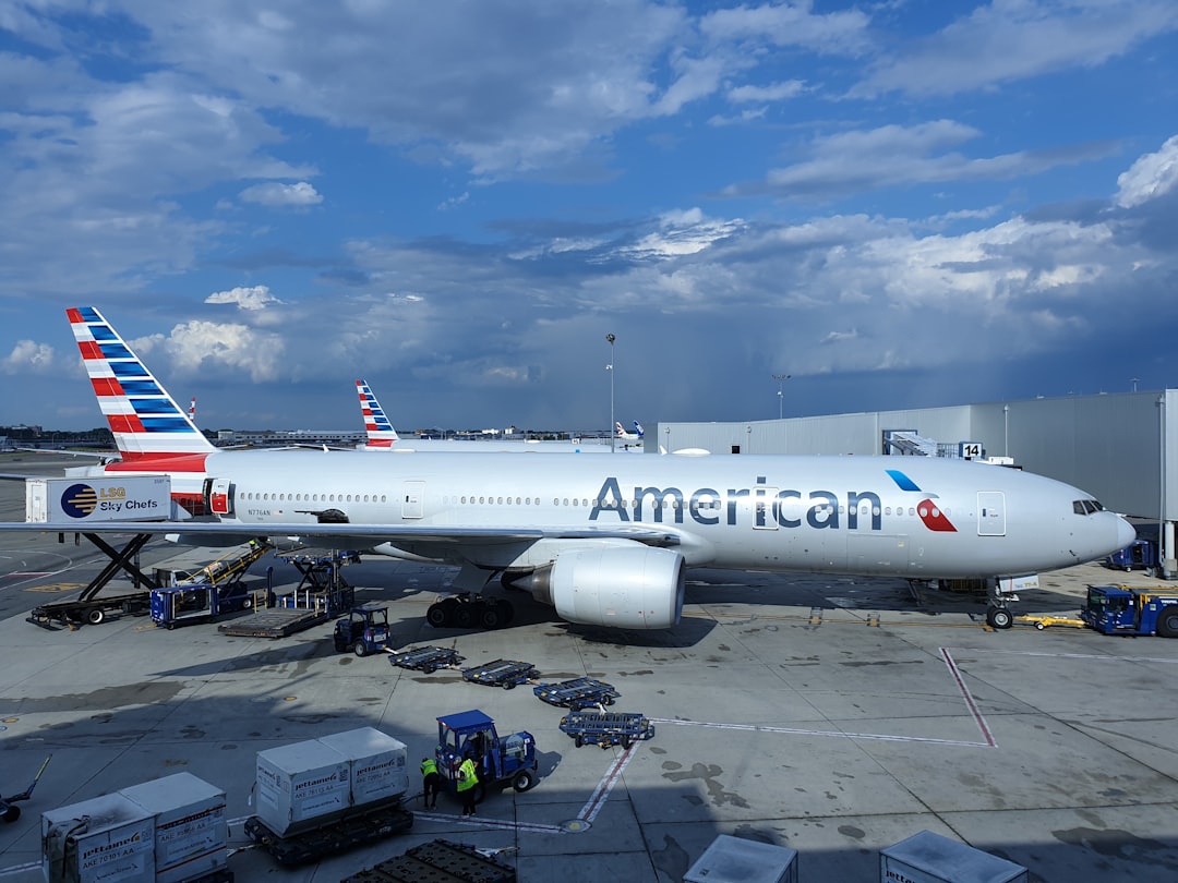 American airliner on airfield during day,