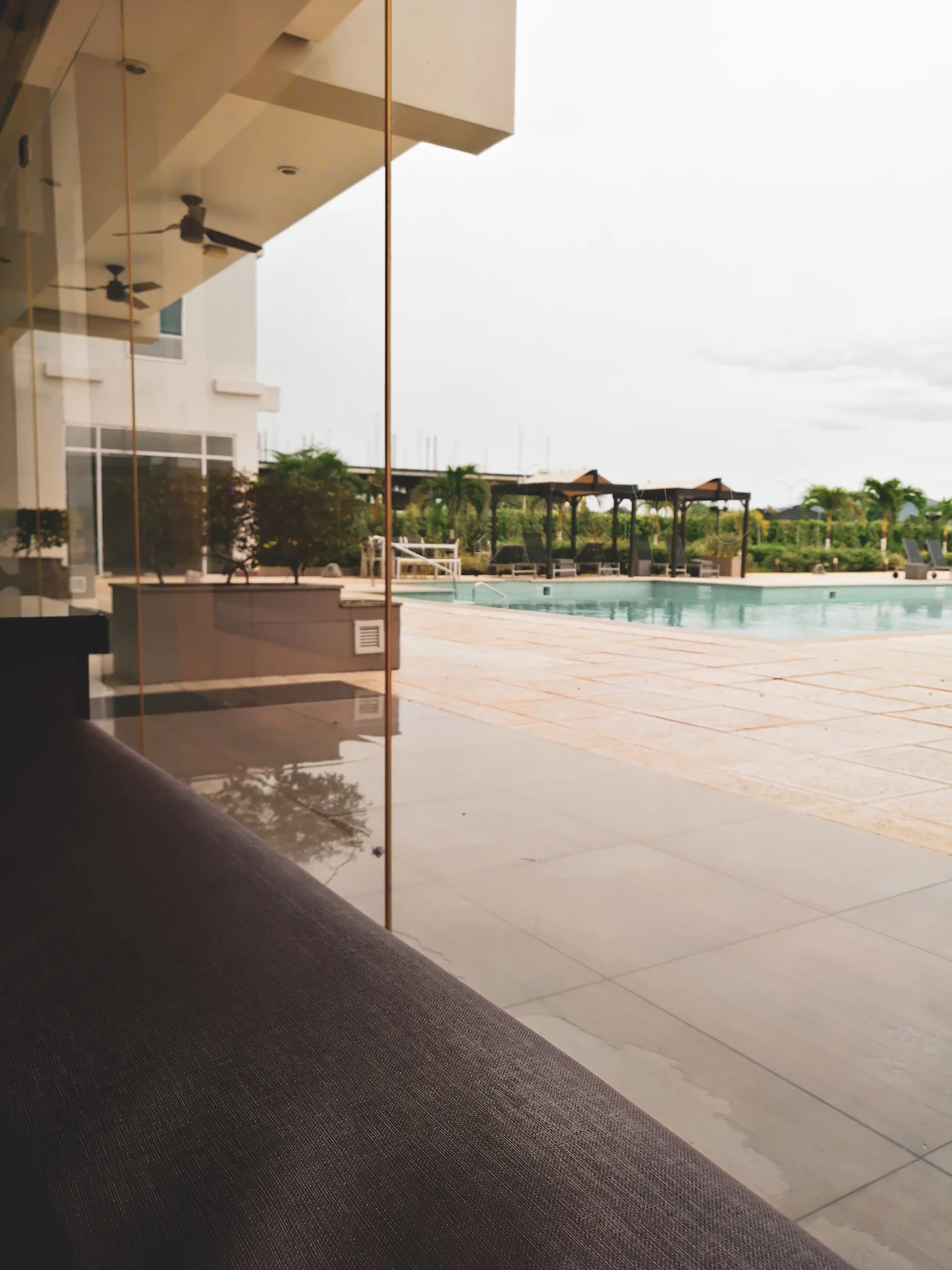 Spring Pool Prep in NWA: Why Glass Pool Fencing Is Taking Over Backyards