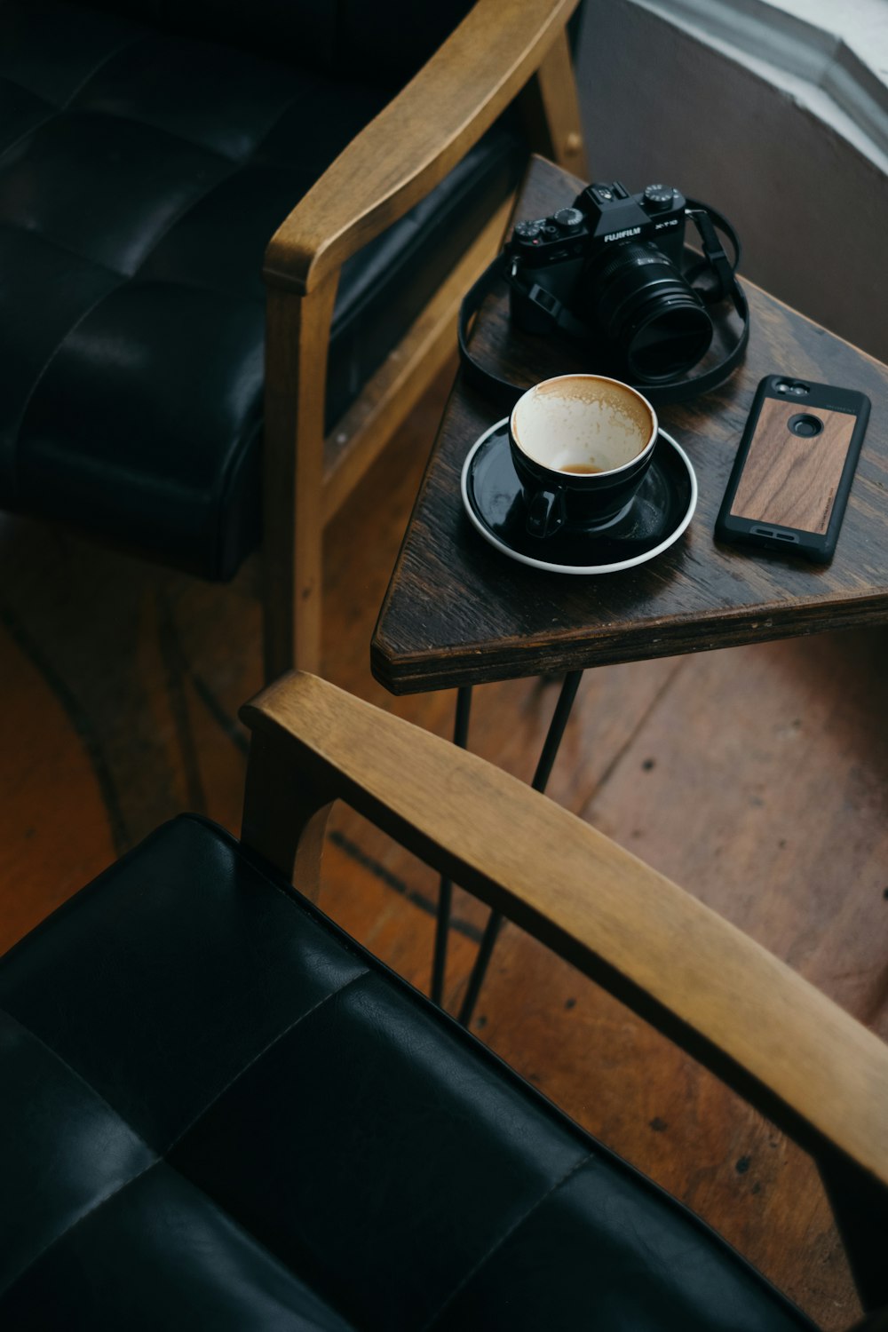 black ceramic mug on saucer