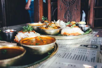 cooked rice and different foods in bowl on table