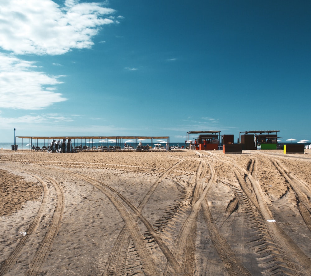 brown sand under clear blue sky