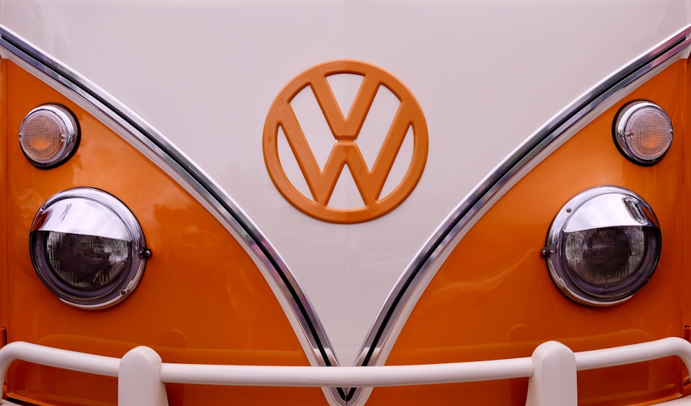 white and orange Volkswagen T1 van