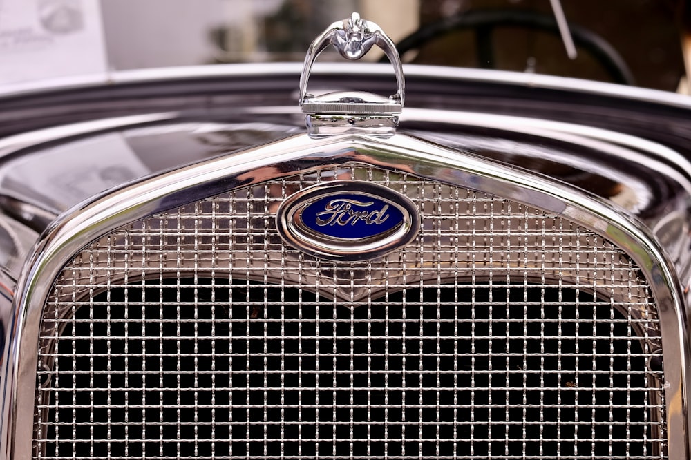 closeup photography of vintage black Ford vehicle
