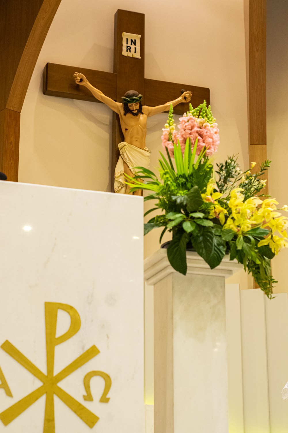 crucifix and flowers