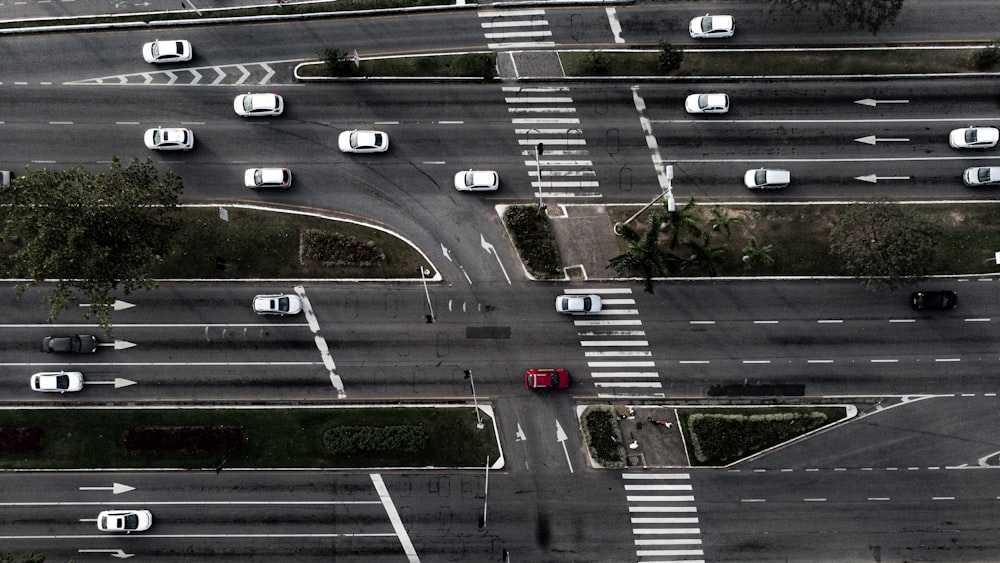 vehicles passing by on roads during daytime