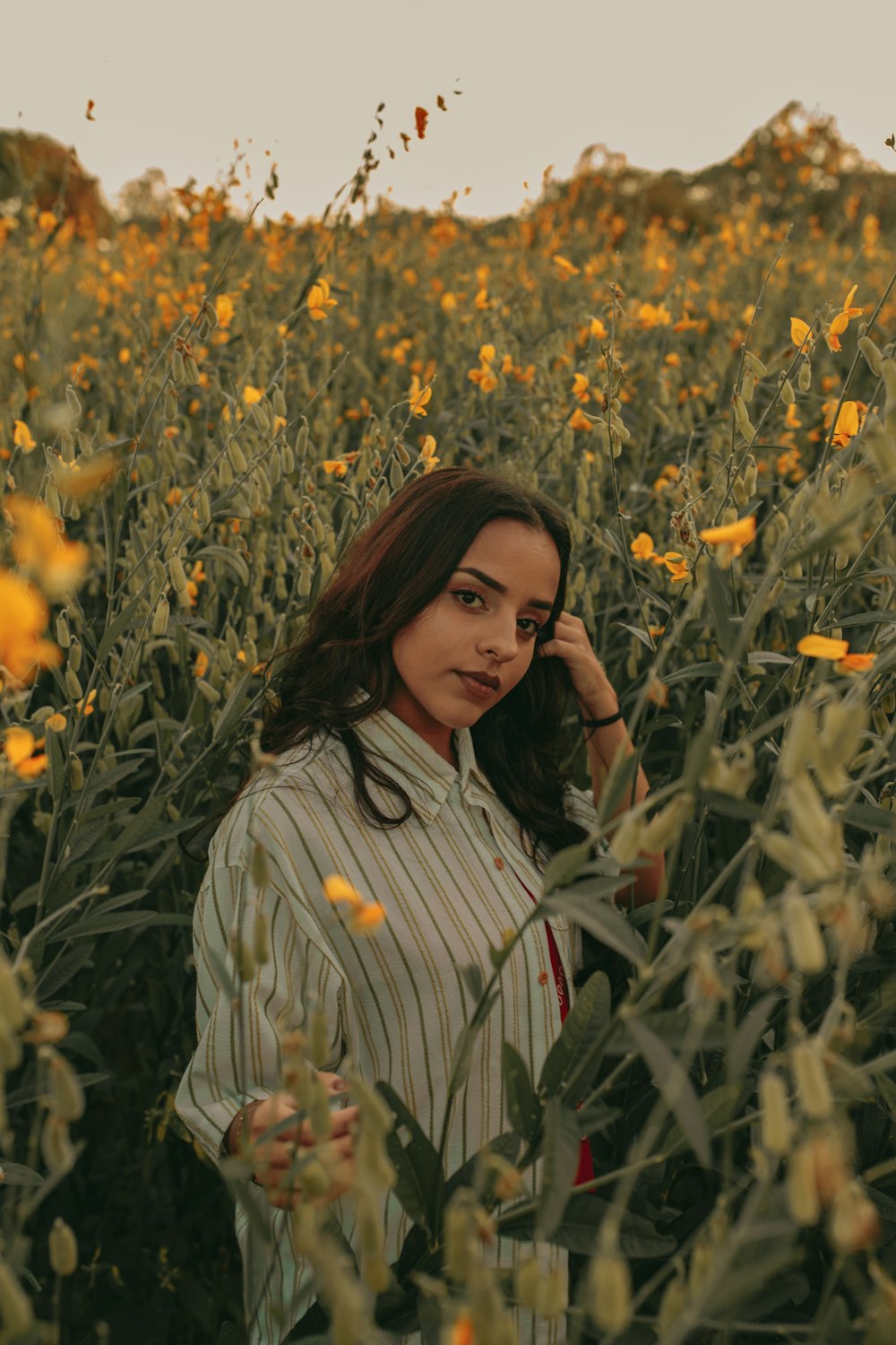 women's yellow and white pinstriped button-up shirt