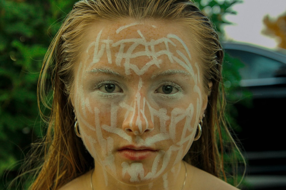 woman with white face paint