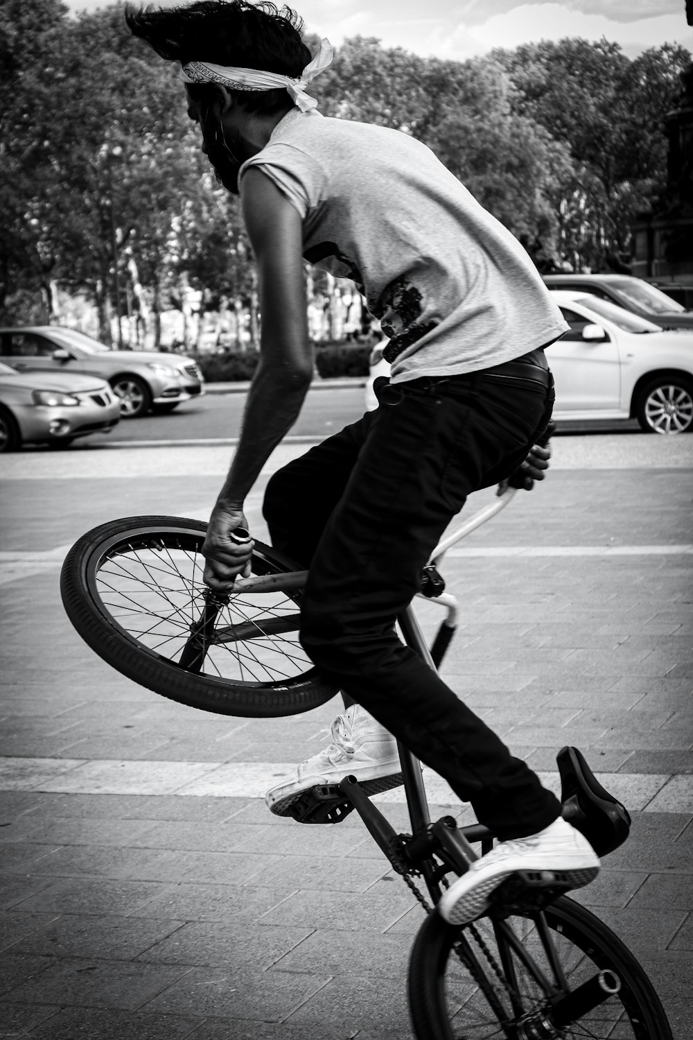 man riding on BMX