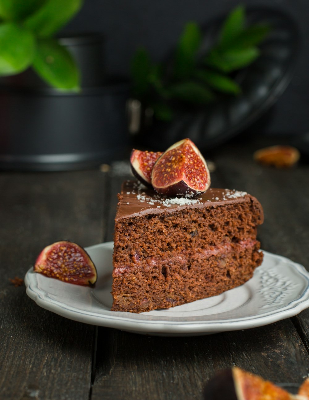 two slices of fig on chocolate cake