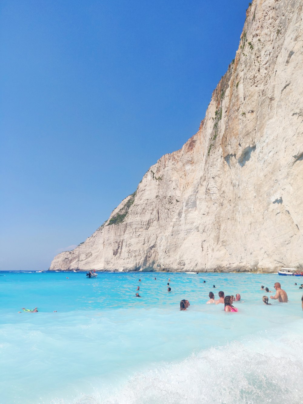 group of people on beach during daytime