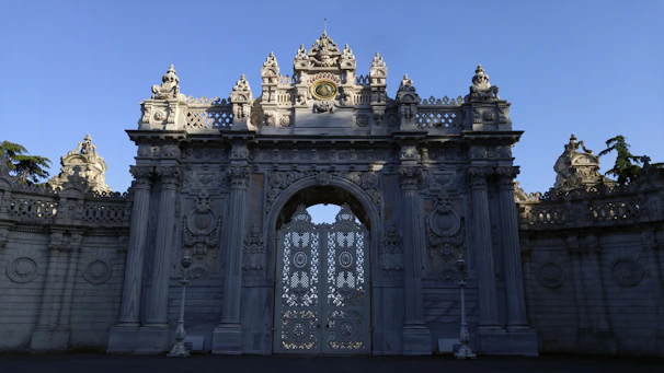 The majestic Bab Mansour gate in Meknes under a clear blue sky