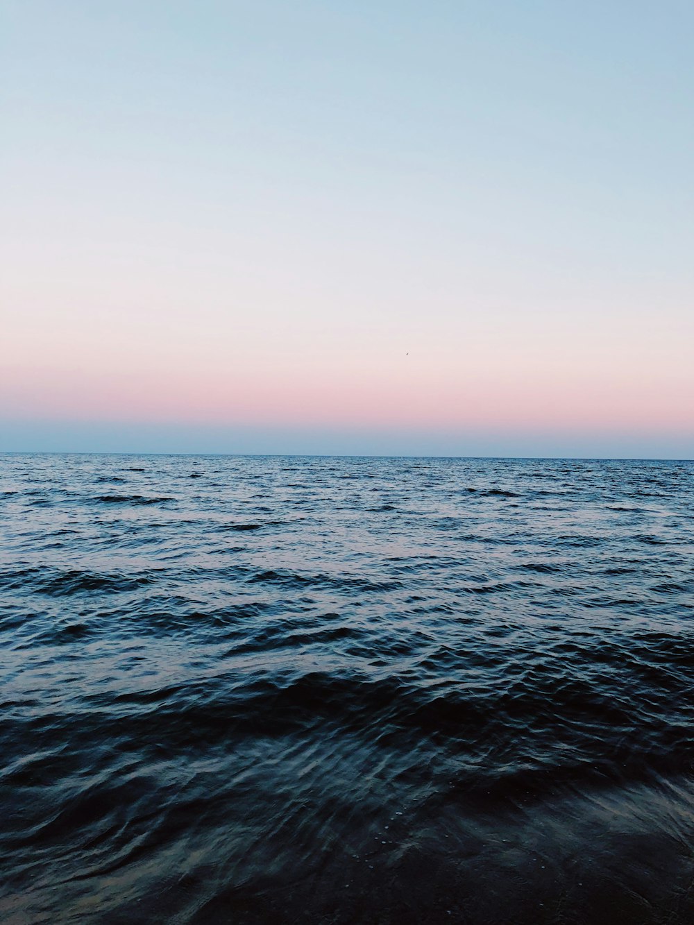 body of water during golden hour